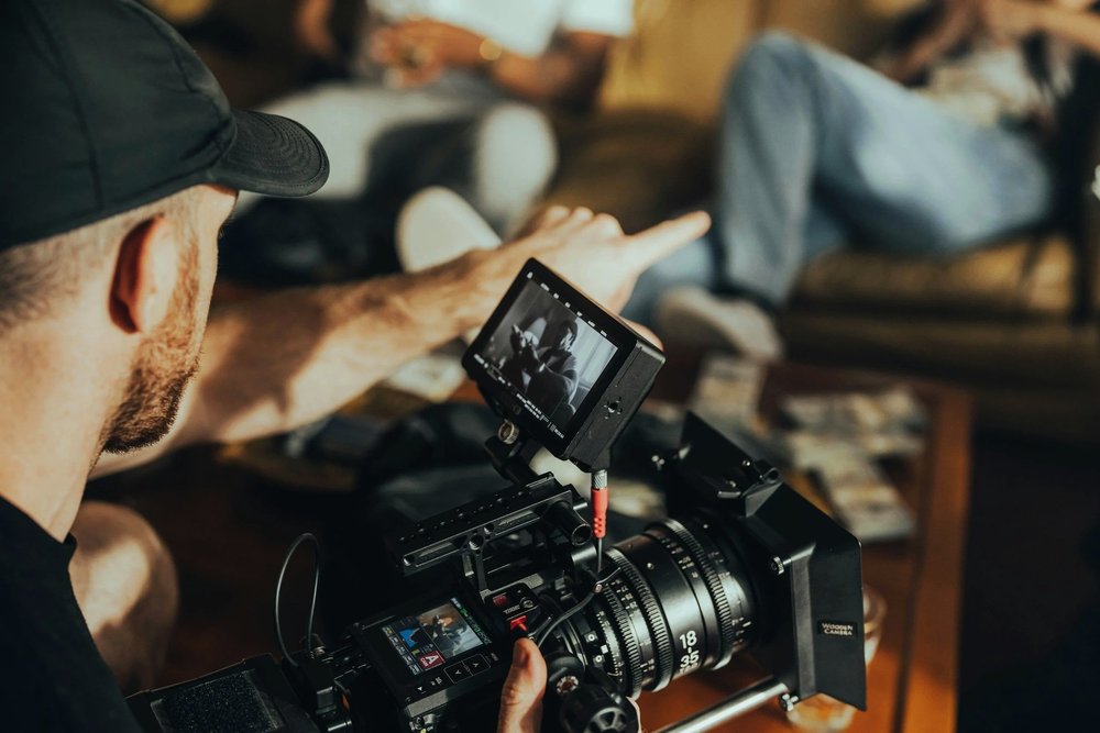 Eric Castillo framing a scene with his cinema camera rig on a commercial shoot